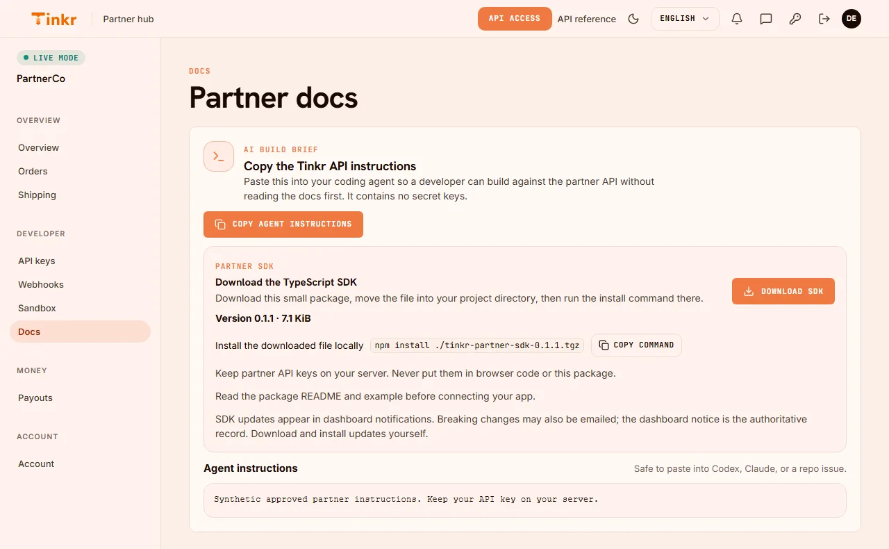 Partner hub docs page with an AI build brief to copy into a coding agent and a TypeScript SDK download.